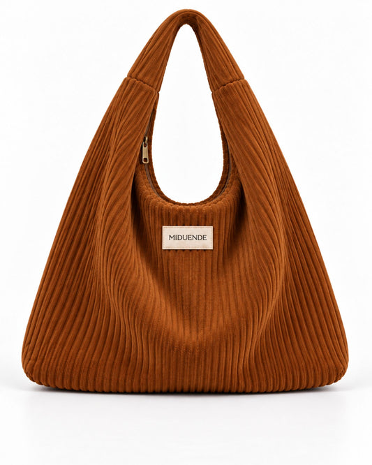 Bolso Hobo en tela de pana color caramelo con cremallera.