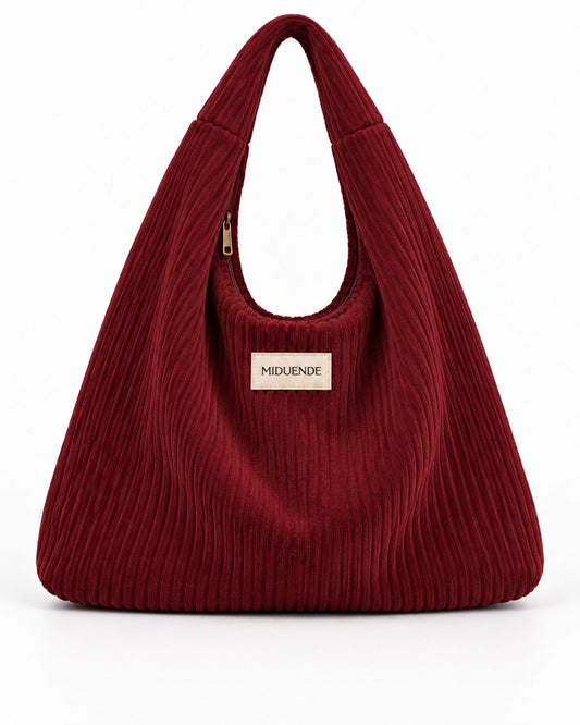 Bolso Hobo en tela de pana color vino con cremallera.